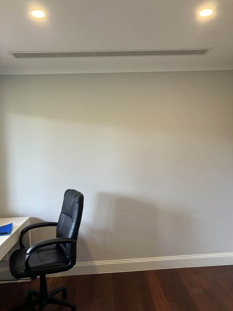 A slot diffuser above a home study, one zone of a ducted system